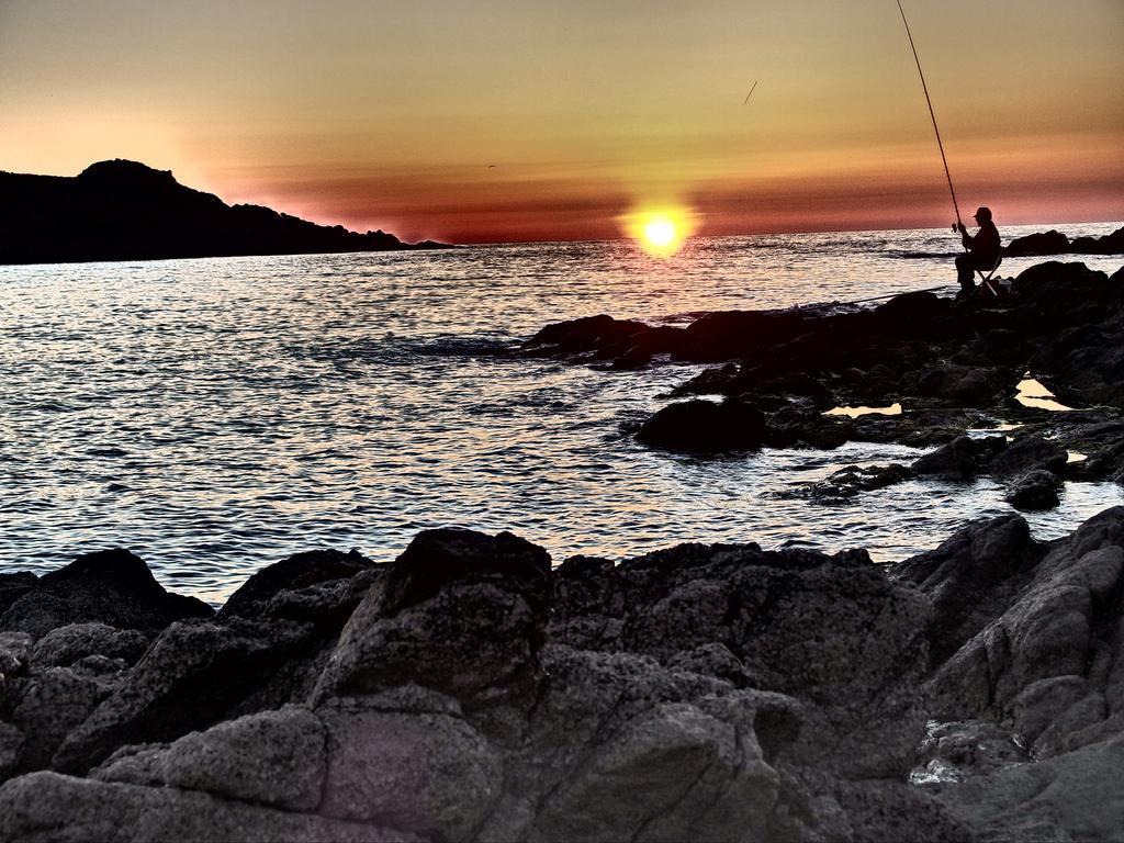 Isola Rossa Appartamenti Superior ภายนอก รูปภาพ