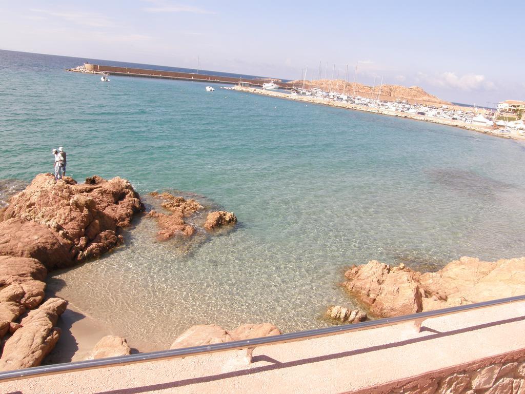 Isola Rossa Appartamenti Superior ภายนอก รูปภาพ